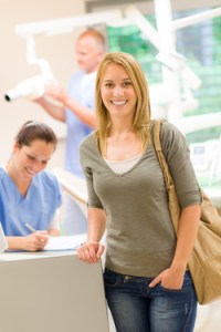 Smiling woman at a dental office